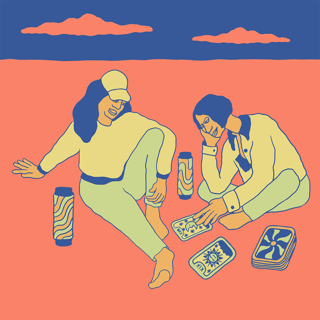 illustration of two women sitting in a park doing tarot cards